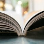 bokeh photography of open book